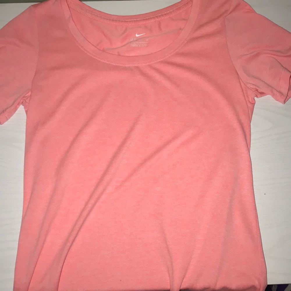 woman’s coral nike tee